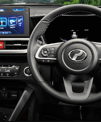 Perodua car parcel shelf lifted out, open access through to the luggage area.