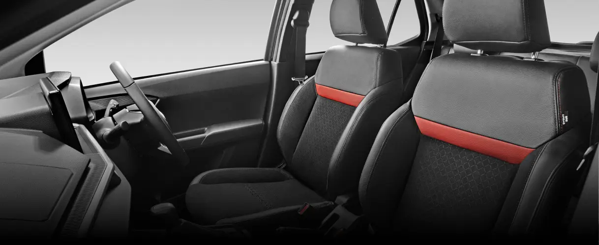 Perodua car steering audio toggle within thumb reach, everyday convenience in focus.