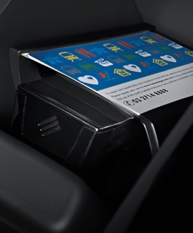 Perodua car tailgate crease lit gently, rear design reads tidy and composed.