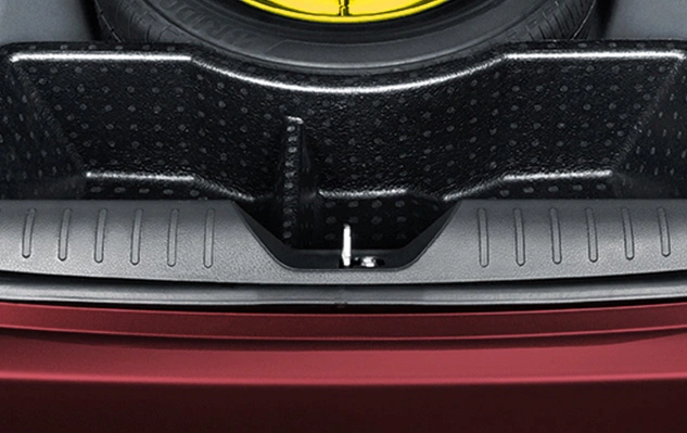 Perodua car mirror casting a small shadow, indicator bar clearly visible.