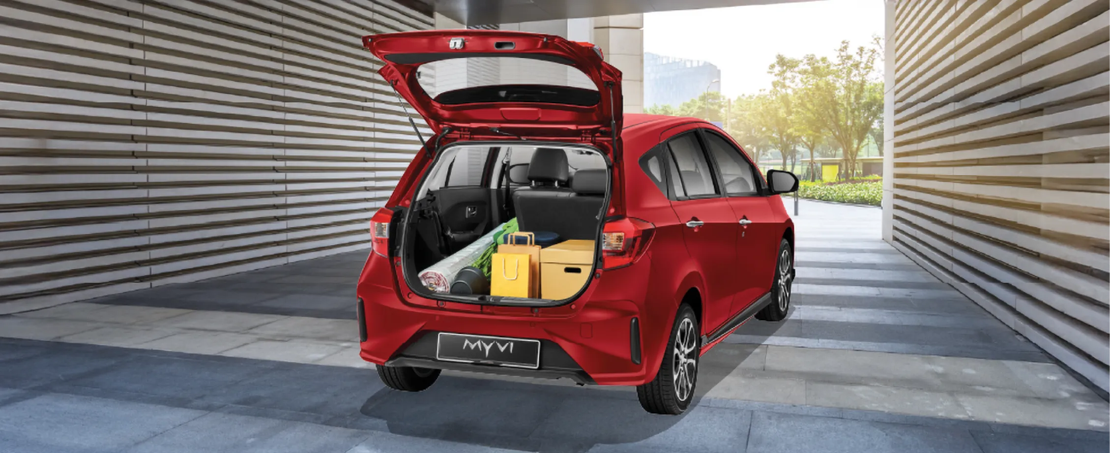 Perodua car shark-fin antenna on a smooth roof panel, a neat modern touch.