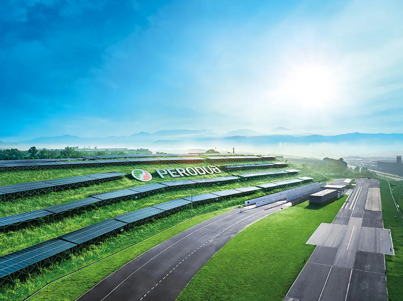 Perodua car headlamp close-up with a crisp, modern light signature.