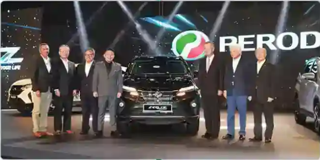 Perodua car angled slightly left to reveal grille, wheel, and profile.